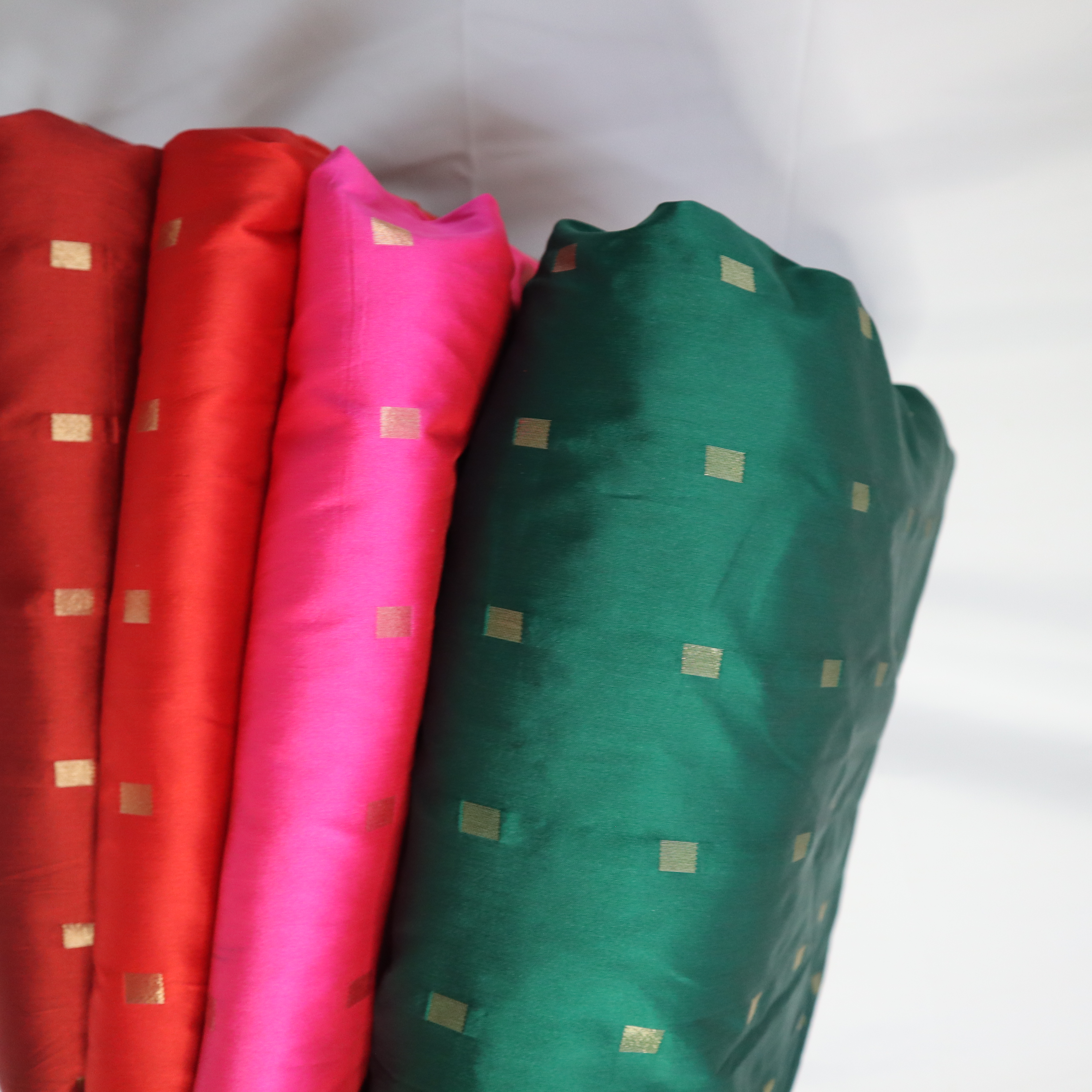south indian Banarasi style work of brocade on taffeta of little small block of square design embedded in weave with golden yarn