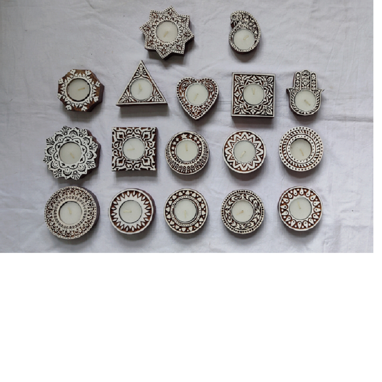 wooden hand carved tea light holders available in a huge assortment of designs suitable for home decoration and gifting
