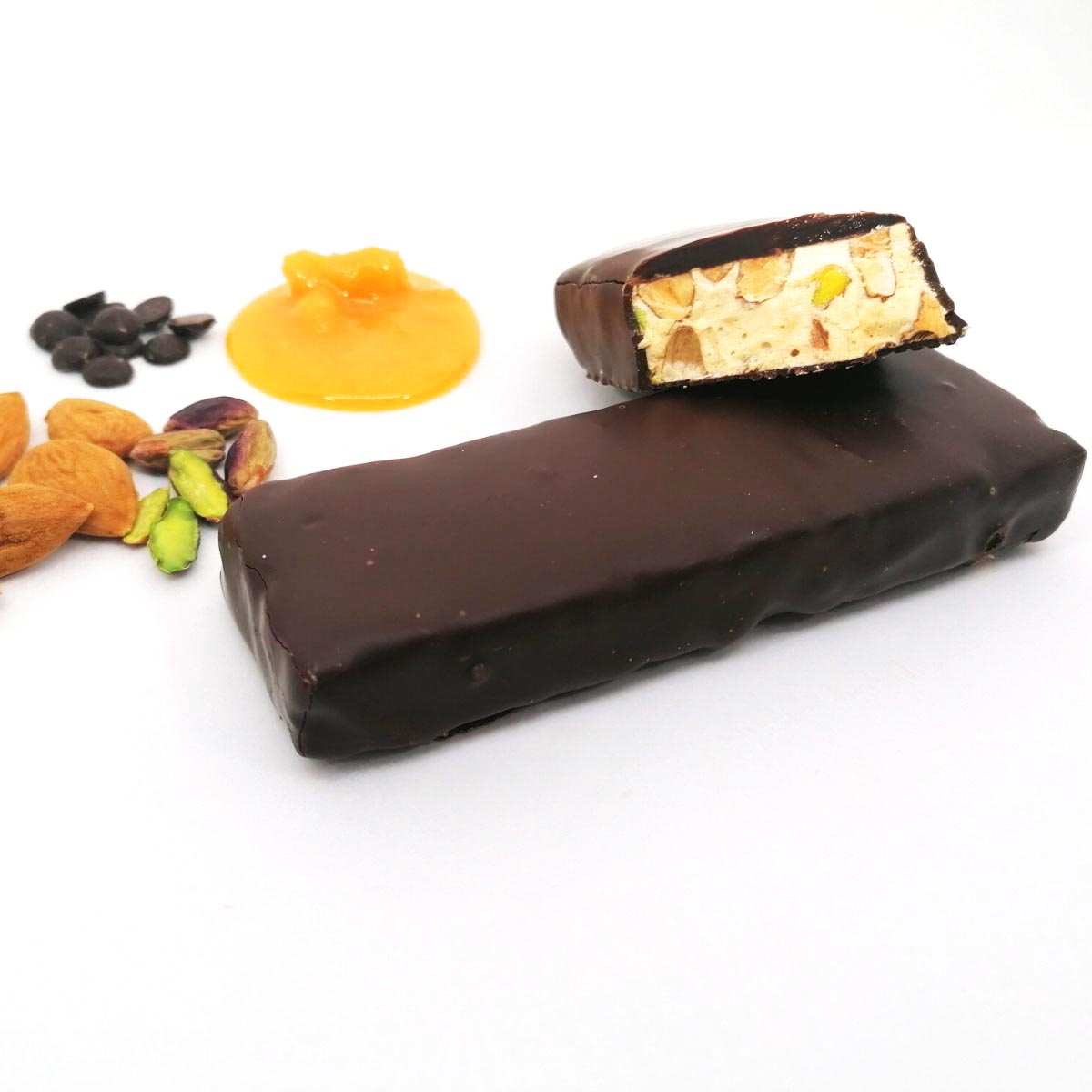 Итальянские традиционные продукта Nougat Умберто Nougat-миндаля и меда на Рассыпчатая сладкий шоколад покрытые