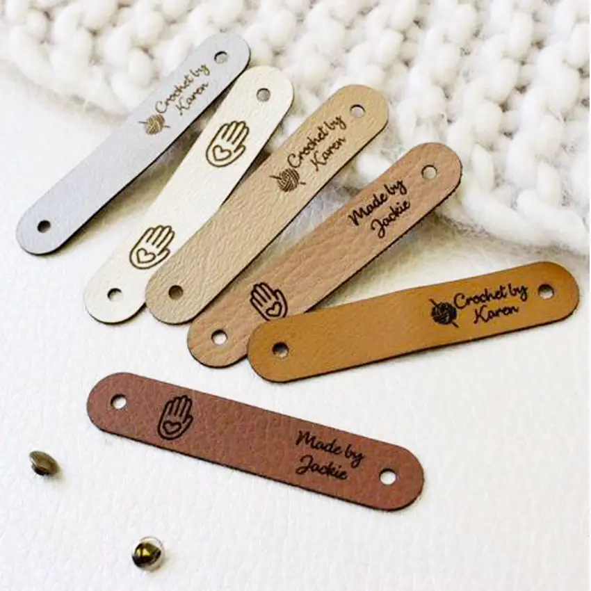 custom debossed logo handmade knitting label faux leather rivet tags