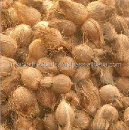 Semi husked coconut