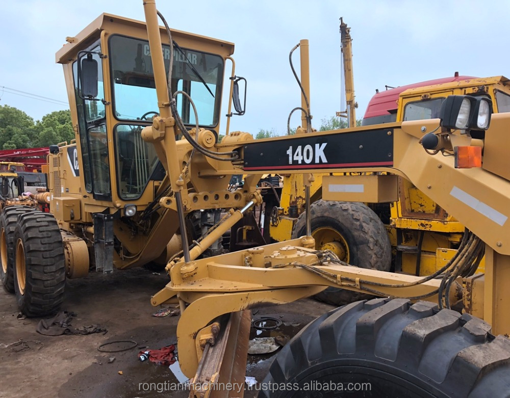Состояние бега оригинальный японский Подержанный Cat 140K автогрейдер для продажи в Шанхае
