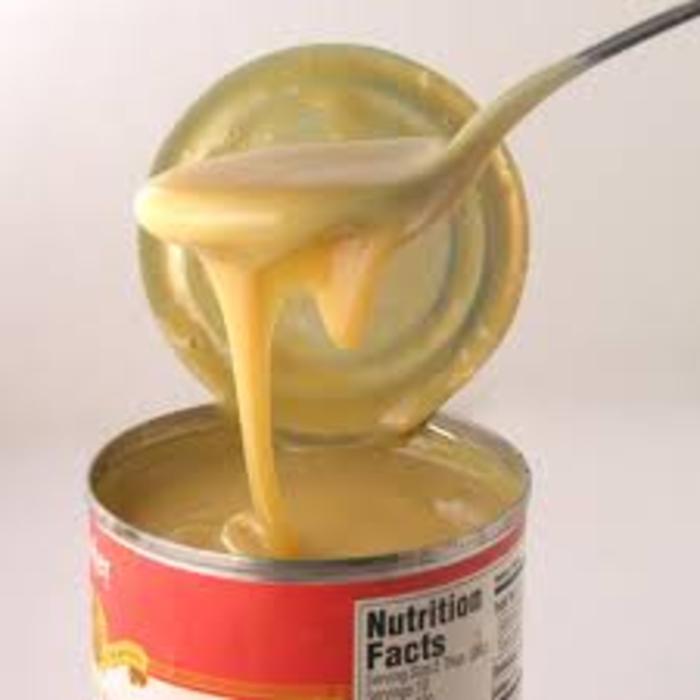 Sweetened Condensed Milk in tins