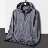 Veste coupe-vent d'hiver pour homme North Down avec col à capuche, face en toile imperméable et respirante, design réversible