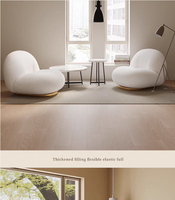 Fauteuil de détente moderne avec revêtement en tissu doux en peau de mouton et base en bois pour salon, chambre et appartement