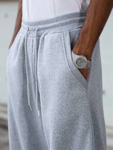 กางเกงจ็อกเกอร์โอเวอร์ไซซ์สีเทากางเกงผู้ชายขาบานกว้างกางเกงวอร์มเอวยางยืดแบบลำลอง - Product Image 6