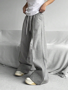 Pantalon de survêtement baggy décontracté pour homme avec taille élastique Pantalon de survêtement athlétique à jambes larges avec poches Pantalon à fermeture à cordon de serrage à taille moyenne - Product Image 3