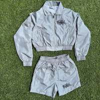 Veste coupe-vent imprimée réfléchissante écologique personnalisée, pantalon de survêtement en nylon à fermeture éclair détachable, short 2-en-1, ensemble de survêtement unisexe