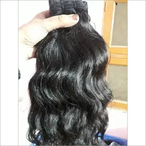 Hot selling wavy Indian natural colour at wholesale factory price unprocessed temple hair wholesaler supplier