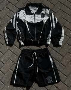 Venta caliente parche bordado chaqueta y chándal corto logotipo personalizado Color Block Zip up Windbreaker Sweatsuit para hombres - Product Image 1