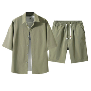 Conjunto informal de dos piezas de verano para hombre, chándal de tela de gofres transpirable en color sólido, pantalones cortos de moda - Product Image 1