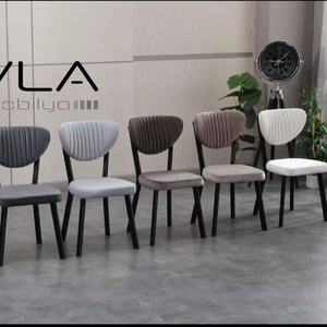 Silla de comedor Premium con patas de metal pintado Tapicería de tela suave, ideal para comedor y cocina Lugares de ahorro hechos en Turquía - Product Image 1