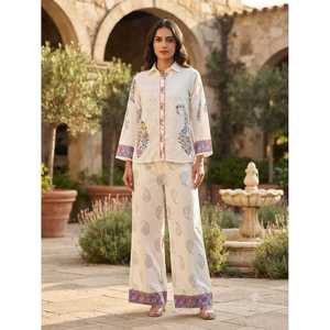 Adoptez les saisons changeantes avec cet ensemble long 2 pièces chic et contemporain pour femme, en velours côtelé de coton blanc brodé et respirant, conçu pour la femme moderne. - Product Image 1