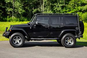 รถจี๊ปแรงเลอร์ อันลิมิเต็ด ซาฮาร่า 4x4 ปี 2014 มือสอง พวงมาลัยซ้าย/ขวา - Product Image 3