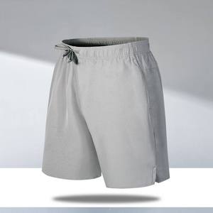 Nouveau short de sport à séchage rapide avec poches à glissière bandes réfléchissantes Shorts d'entraînement de sport pour hommes Shorts de course - Product Image 3