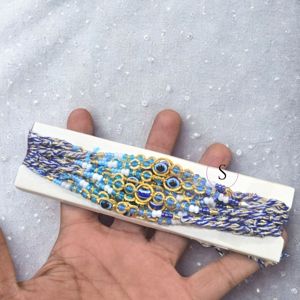 Nueva llegada 2025 Venta caliente Eye Pattern Designer Rakhi's para Bhaiya y Bhabhi Rakhis (juego de 12 ), lote a granel de Rakhi Wear - Product Image 1