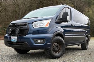 Ford Transit 150 XLT AWD 2020 d'occasion en bon état, 1 propriétaire, modifications Overland, 7 places, plateforme de lit arrière, transmission intégrale - Product Image 3