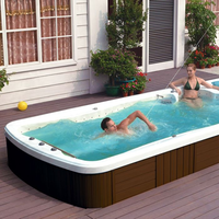 Piscine spa de nage extérieure en acrylique avec section de massage par hydro-jet Zone de baignade à débit d'eau Design ergonomique et éclairage d'ambiance LED