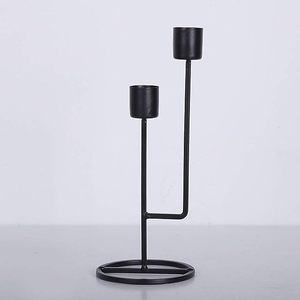 Soporte de vela de Base de hierro hecho a mano de lujo moderno de nuevo diseño con acabado negro para decoración de mesa de hogar y oficina - Product Image 1