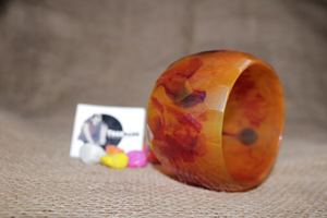 Bracelet en résine de qualité supérieure en forme de cercle de conception hexagonale Bracelet en résine de couleur Orang pour les femmes Tradnary - Product Image 4