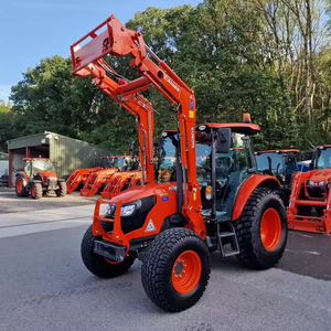 Cargador de ruedas Kubota M4072 con equipo agrícola frontal y retroexcavadora - Product Image 1