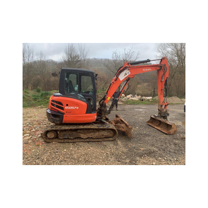 Mini pelleteuse KX057-4 Kubota à chenilles hydraulique forte et compacte, adaptée aux travaux de construction et d'aménagement paysager. - Product Image 4