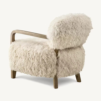 Fauteuil de loisirs Taddeus en tissu noir brossé tendance et structure en bois massif pour salon, hôtel, appartement