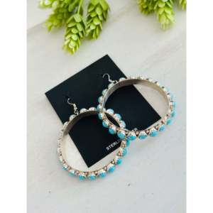 Boucles d'oreilles pendantes en turquoise Sleeping Beauty et argent sterling, faites à la main par des artisans Navajo - Product Image 4