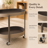 Table console ovale moderne et écologique à 2 niveaux en cuir PU avec roulettes pour le salon
