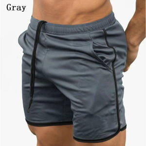 Pantalones cortos deportivos con cordón de poliéster 2025 para hombre, venta al por mayor, pantalones cortos de playa calientes transpirables personalizados, patrón sólido, ecológicos, 100% - Product Image 2