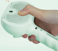 Brosse à vapeur autonettoyante pour le toilettage des poils d'animaux.