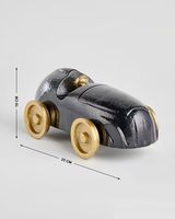 Statue de voiture de course moderne élégante faite à la main, finition dorée, en aluminium moulé, décoration de table artisanale pour salon ou bureau