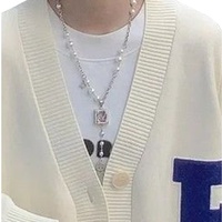 Pull cardigan en tricot épais unisexe personnalisé pour l'hiver 2025, fabrication OEM, manches longues, ample, grande taille, décontracté, appliques, basique