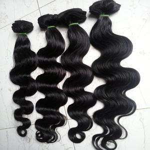 Paquete de cabello humano ondulado de cuerpo indio Virgen sin procesar 100% al por mayor | Tejido de cabello Remy negro Natural para salón y suministros de belleza - Product Image 4