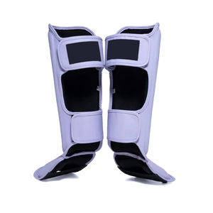 Precio al por mayor Material de PU Shin Step Adultos Unisex Protección profesional Espinilleras Gancho Cierre de bucle MMA - Product Image 3