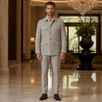 Costume Homme Beige Pierre Style Safari Col Pointu Cinq Boutons Poches à Soufflets Revers Retournés Costumes d'Affaires Homme Sur Mesure MTM