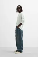 Jean baggy en denim pour homme, coupe ample et oversize, style vintage déchiré, coupe droite, délavage foncé, imprimé, style streetwear, coloré