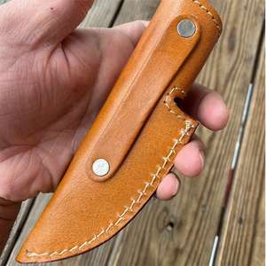 Funda para cuchillo de cuero marrón hecha a mano con estampado decorativo y cierre de broche de latón. - Product Image 2