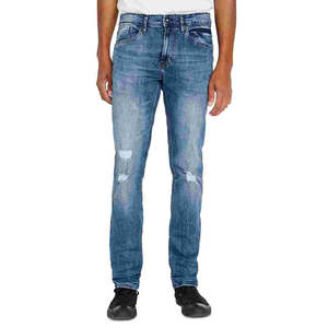 Jeans Buffalo David Bitton para Hombre, Modelo Ash-X, Corte Slim Fit, Denim Lavado, Talla 32X32, Estilo Patchwork Azul con Decoración de Remaches - Product Image 1