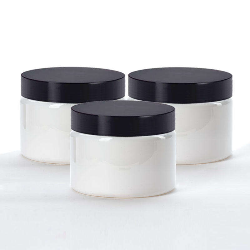 white jar with black lid