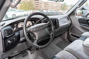 Ford F-150 SVT Lightning 2003 Usada en Buen Estado, 40500 Millas, Motor V8 Supercargado, Color Gris Sombra Oscuro, Propiedad de Oregon - Product Image 4