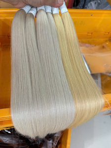 Extensions de cheveux blonds 613 vietnamiens Remy permanentés en gros, tissage de cheveux en vrac à double trame faite à la machine - Product Image 1