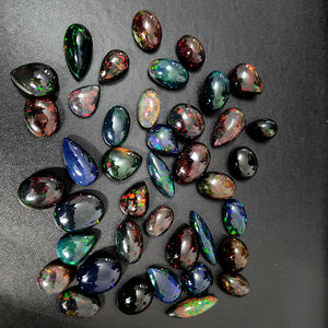18 pièces d'opale noire éthiopienne naturelle avec feu, 10 mm à 20 mm, ovale, poire, rond, cabochon, 87 carats, pierres précieuses Iroc Sales, cabochon, 380 $ US - Product Image 1