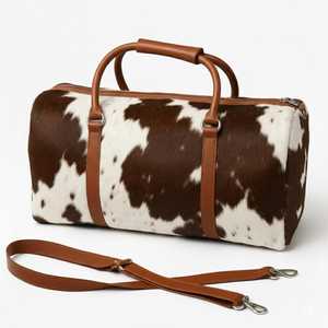 กระเป๋าเดินทางหนังแท้แบบมีขน ขายออนไลน์ ขายดีที่สุด ขายส่ง กระเป๋าเดินทางหนังแท้สไตล์ไม่ซ้ำใคร ราคาถูก - Product Image 6