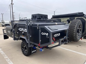 รถพ่วงแคมป์ปิ้ง Opus OP2 สีดำ ขับเคลื่อน 4 ล้อ สำหรับใช้งานออฟโรด พร้อมระบบกันสะเทือนอิสระ รองรับผู้โดยสาร 4 คน สำหรับการใช้งานอเนกประสงค์ - Product Image 3
