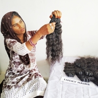 Pelo humano natural al por mayor precio de fábrica paquete ondulado trama sin procesar cutícula alineada cabello humano peruano virgen