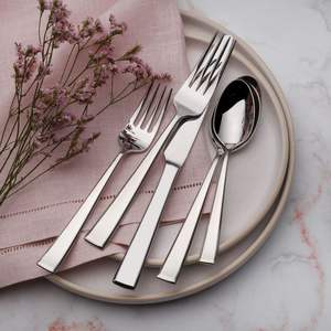 Metal cutlery set with unique geometric <b>handle</b> design for a modern classy aesthetic dinner table presentation - Product Image 4