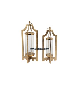 Stylish <b>Lantern</b> <b>Candle</b> Holder Metal Frame Clear Glass <b>Candle</b> Hanging Holder Wholesale Price Metal Table Top <b>Candle</b> Holder - Product Image 1