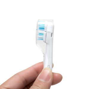 Cabezales de repuesto Toocare multicolor con diseños únicos y cubierta de plástico para cepillo de dientes - Product Image 3