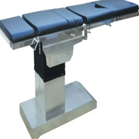 Table d'opération chirurgicale hospitalière avec sections et supports de bras réglables pour interventions de chirurgie générale et ophtalmologie